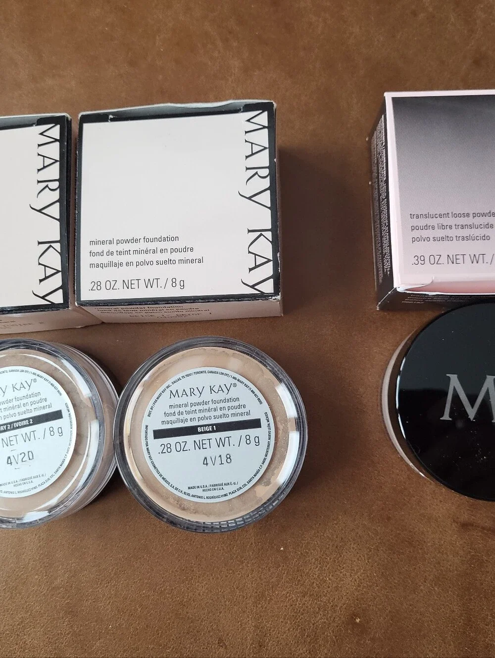 3) Mary Kay Products. 2) Mineral Powder Foundation, 1) Transculent Loose Powder.